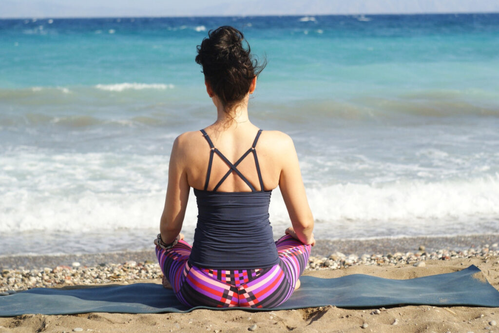 Image of a lady in meditation.